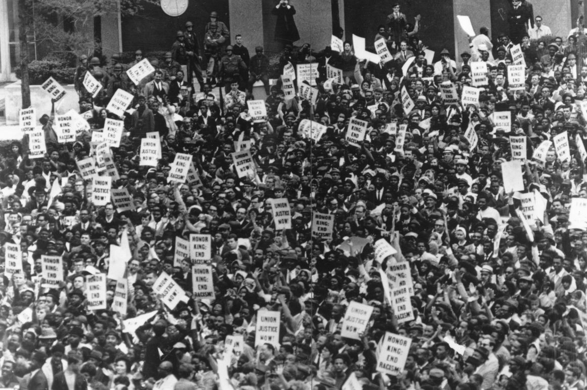 Thousands of people lining the streets of Atlanta, Georgia, for the funeral of Martin Luther King Jr., on April 9th, 1968.