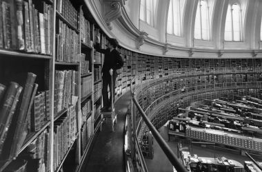 A black and white photograph of a library