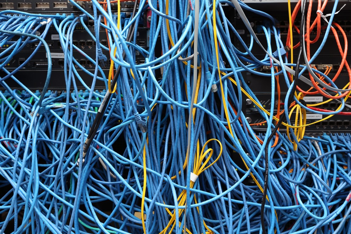 Network cables are plugged in a server room