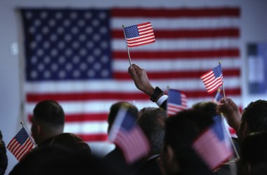 New American citizens celebrate at a naturalization ceremony in Newark, New Jersey.