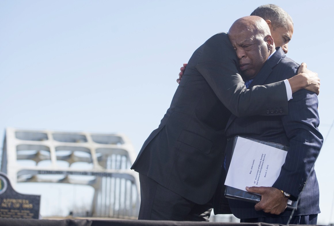 Then-President Barack Obama hugs U.S. Representative John Lewis of Georgia, one of the original marchers at Selma, during an event marking the 50th anniversary of the marches from Selma to Montgomery at the Edmund Pettus Bridge in Selma, Alabama, on March 7th, 2015.