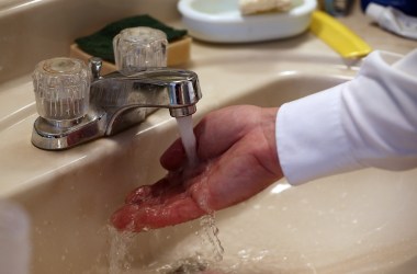 Plumbing technician Todd Snider tests the flow of water after installing an aerator at a home on February 5th, 2014, in Novato, California. Many Californians have installed water-saving devices in their homes like low-flow toilets, shower heads, and aerators.