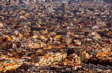 Residential buildings stand on the city skyline in Barcelona, Spain.