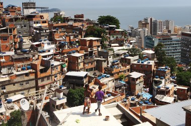 Boys gather while flying kites in the Cantagalo shantytown community next to neighboring Pavao-Pavaozinho in Rio de Janeiro, Brazil.