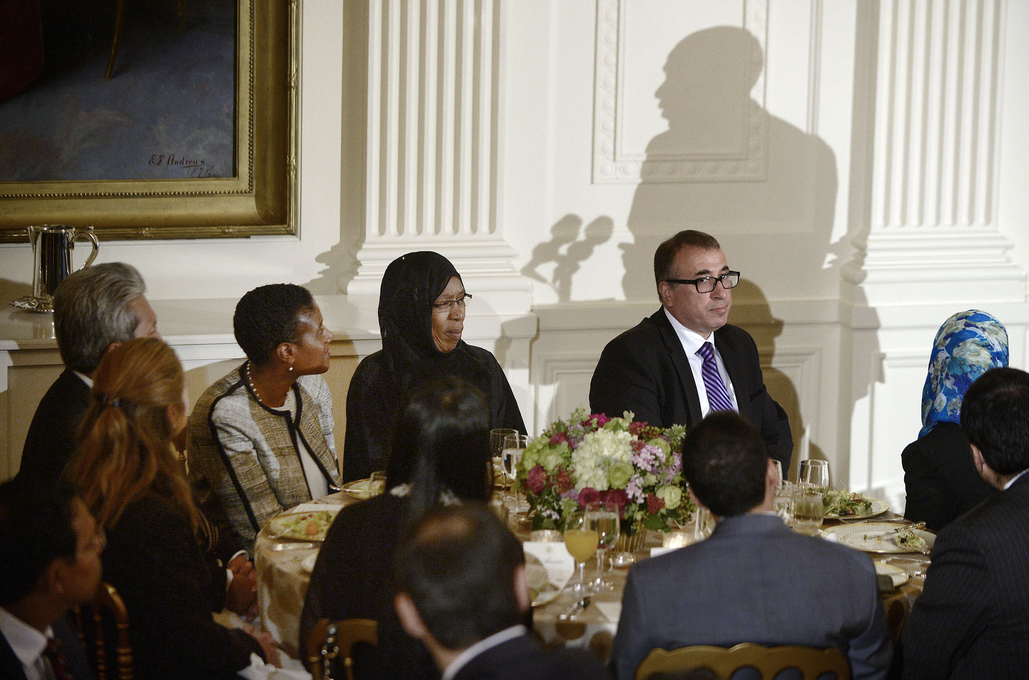 Guests at the 2015 Ramadan dinner listen as President Barack Obama speaks in the East Room of the White House in Washington, D.C.