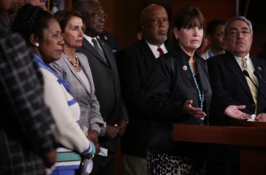 Flanked by other House Democrats, U.S. Representative Betty McCollum, center, speaks as House Minority Leader Nancy Pelosi listens during a news conference about the Confederate flag on July 9th, 2015, in Washington, D.C.