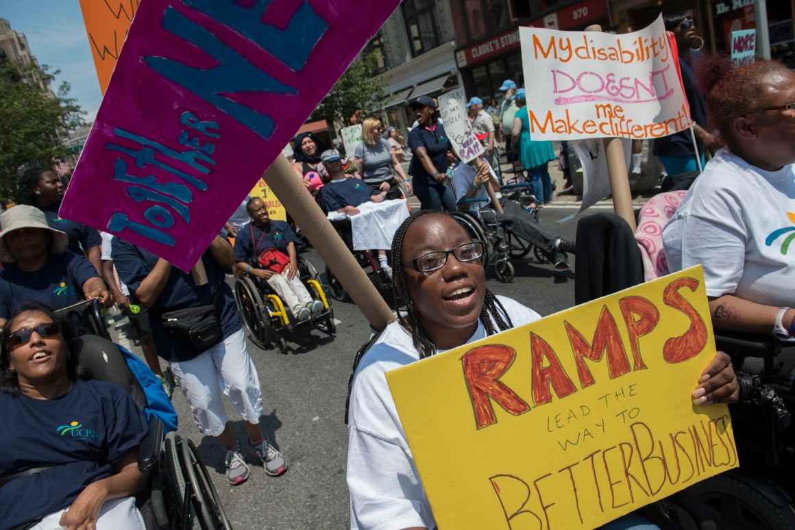 People participate in the first annual Disability Pride Parade on the 25th anniversary of the Americans With Disabilities Act on July 12th, 2015, in New York City.