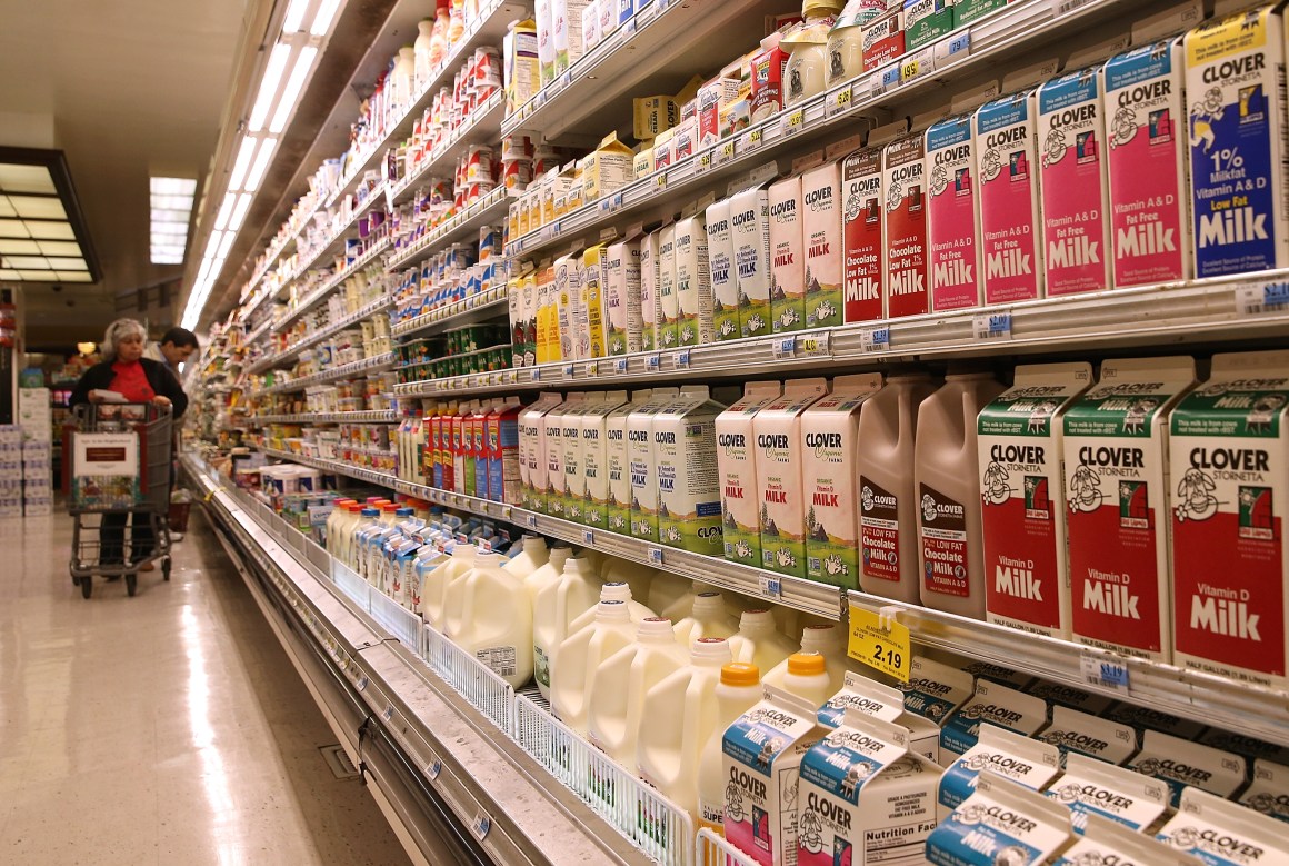 Containers of milk are displayed at Cal-Mart Grocery in San Francisco, California.