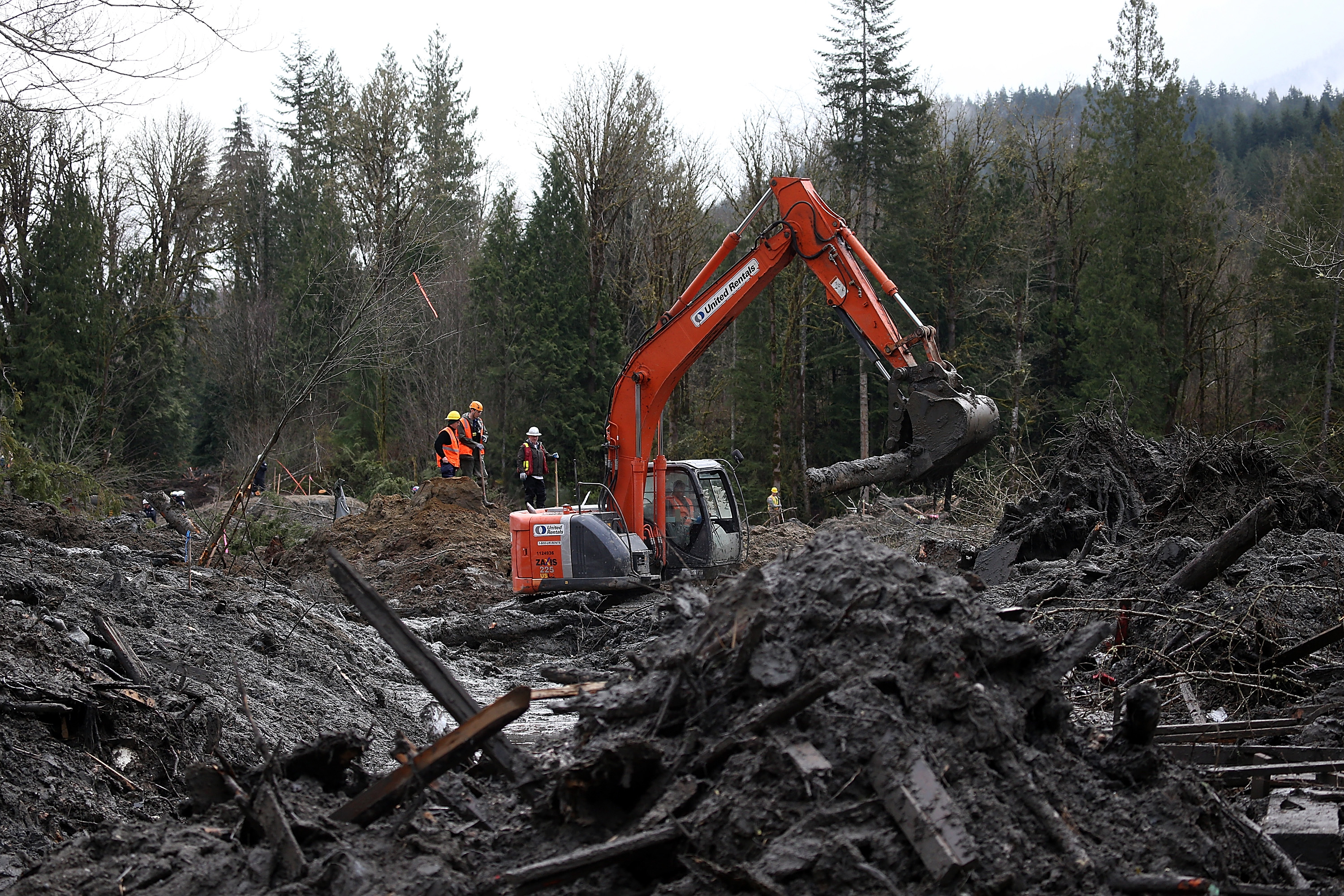 Search and rescue crews sift through debris from a deadly mudslide on April 4th, 2014, in Oso, Washington.