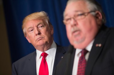 Sam Clovis speaks during a news conference with Donald Trump ahead of a rally in Grand River Center, Iowa, on August 25th, 2015.