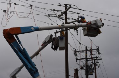 Linesmen from Pacific Gas and Electric repair power lines after the Valley Fire swept through the town of Middletown, California, on September 16th, 2015.