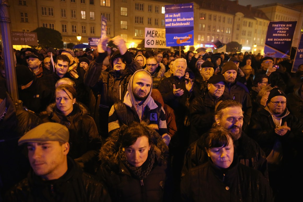 Supporters of the AfD political party attend a rally to protest against German Chancellor Angela Merkel’s liberal policy toward taking in migrants and refugees on October 14th, 2015, in Magdeburg, Germany.