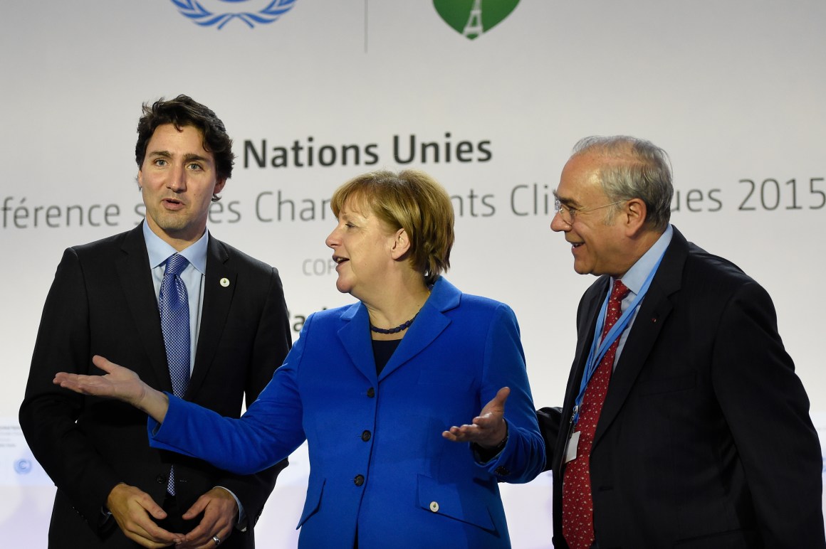 From left, Canadian Prime Minister Justin Trudeau, German Chancellor Angela Merkel, and OECD president Angel Gurria at COP21 on the outskirts of Paris on November 30th, 2015.