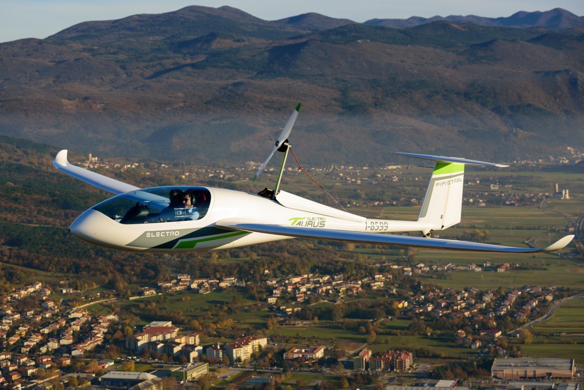 A Pipistrel Taurus Electro electric two-seat airplane flies above Ajdovscina, Slovenia, on November 10th, 2015.