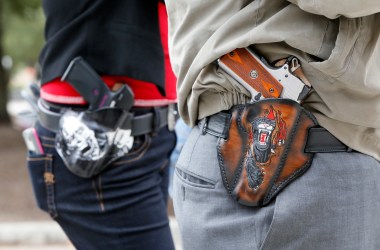 People carry pistols on January 1st, 2016 in Austin, Texas.