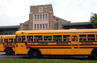 School buses stop to drop students at Merion Elementary School.