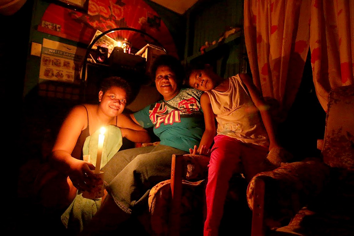 A family weathers the loss of power after Cyclone Winston swept through Fiji in 2016.