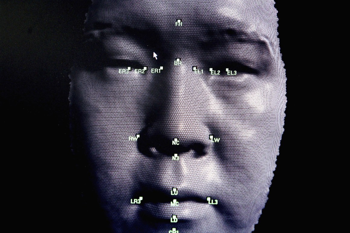 A 3-D facial-recognition program is demonstrated during the Biometrics 2004 exhibition and conference.