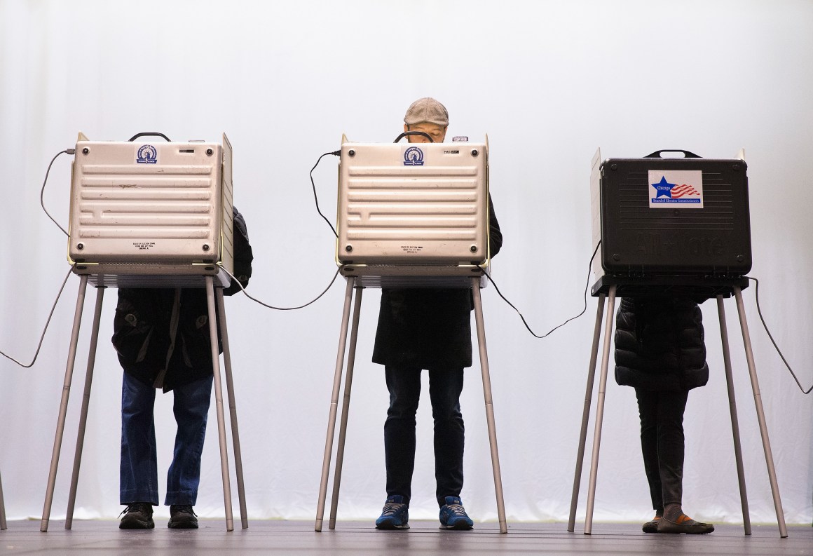 Voters cast their ballots at ChiArts High School.