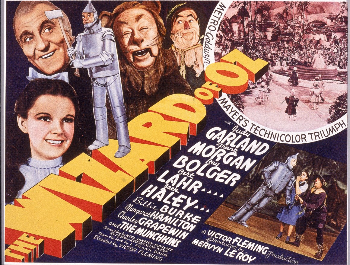 A lobby card from The Wizard Of Oz (1939) shows an illustration of American actress Judy Garland as Dorothy, Frank Morgan as the Wizard, Jack Haley as the Tin Man, Bert Lahr as the Cowardly Lion, and Ray Bolger as the Scarecrow.