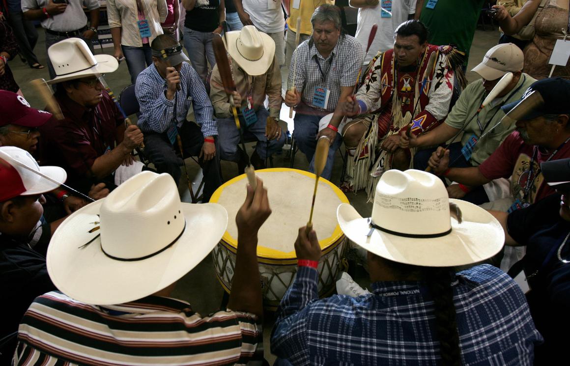 Native Americans from the drum band Yellow Hammer provide a beat on August 12th, 2005, at the MCI Center in Washington, D.C.