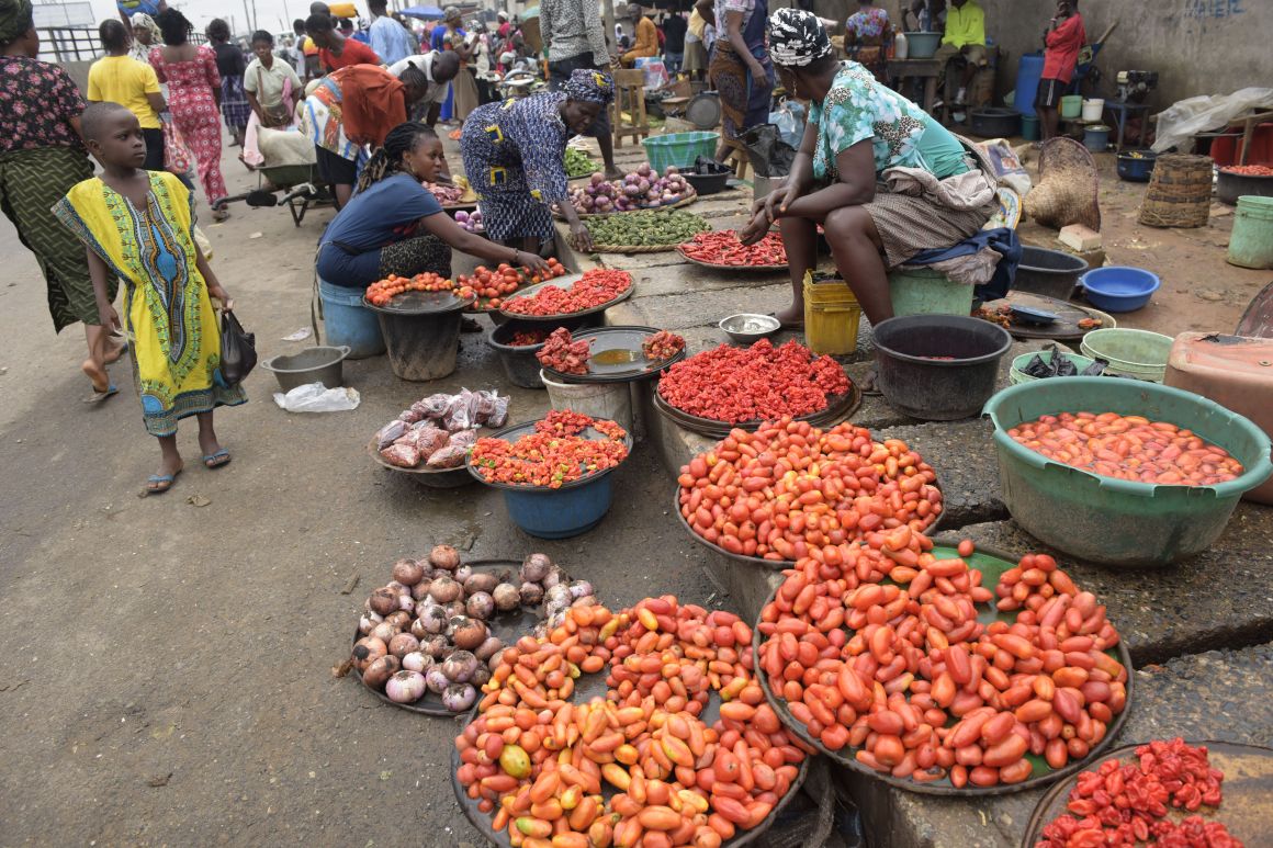 Vendors display tomatoes and pepper at Mile 12 market in Lagos, Nigeria.