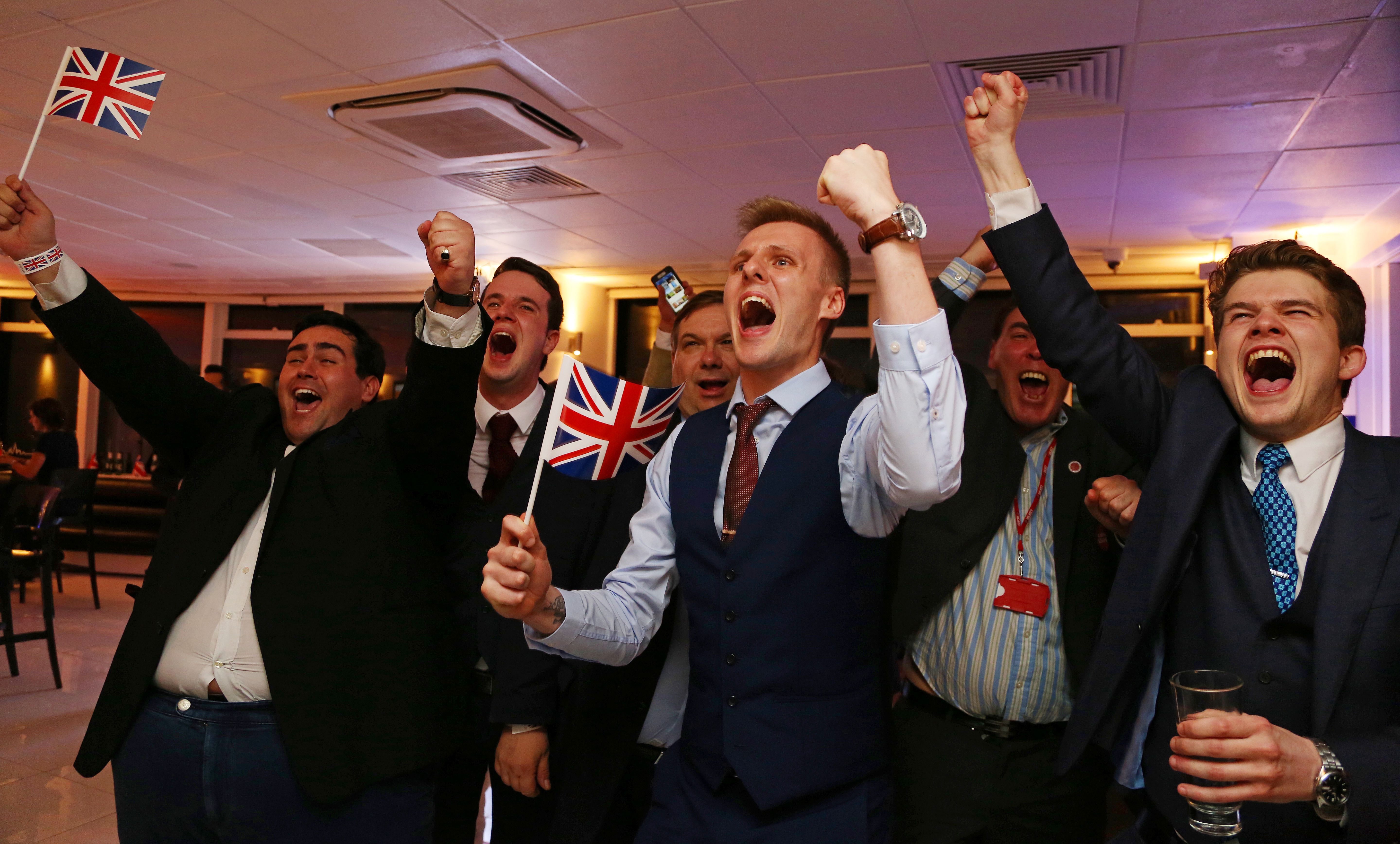 People wave Union flags in London, England, on June 24th, 2016.