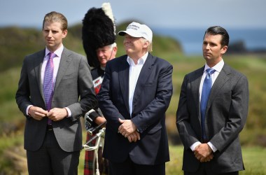 Donald Trump stands with his two sons following a press conference on the 9th tee at his Trump Turnberry Resort on June 24th, 2016, in Ayr, Scotland.