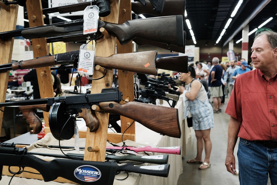 Gun enthusiasts visit a gun show where thousands of different weapons are displayed for sale on July 10th, 2016, in Fort Worth, Texas.