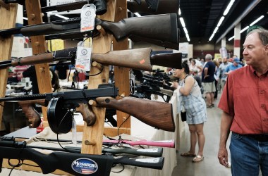 Gun enthusiasts visit a gun show where thousands of different weapons are displayed for sale on July 10th, 2016, in Fort Worth, Texas.