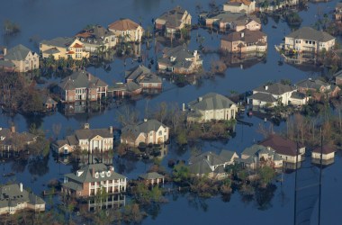 An aerial image of neighborhoods flooded with oil and water two weeks after Hurricane Katrina went though Louisiana on September 12th, 2005, in New Orleans, Louisiana.