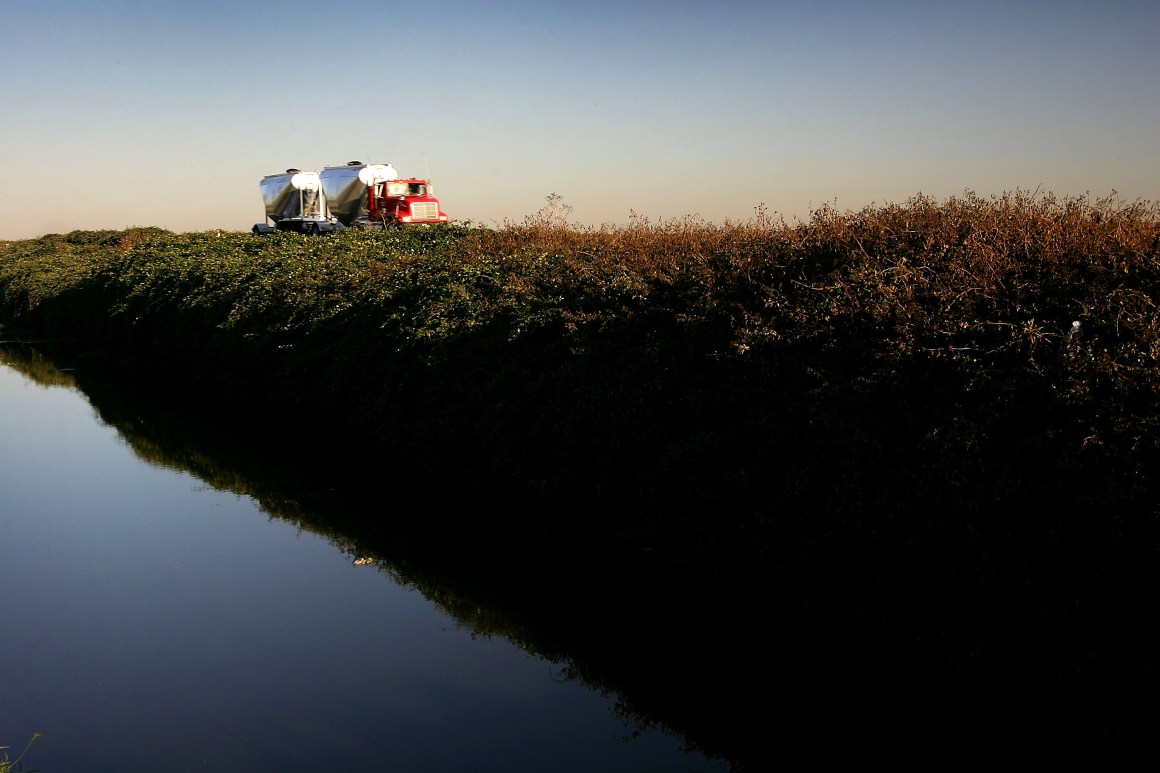 Traffic on Highway 4 travels along a canal in the Sacramento-San Joaquin River Delta.