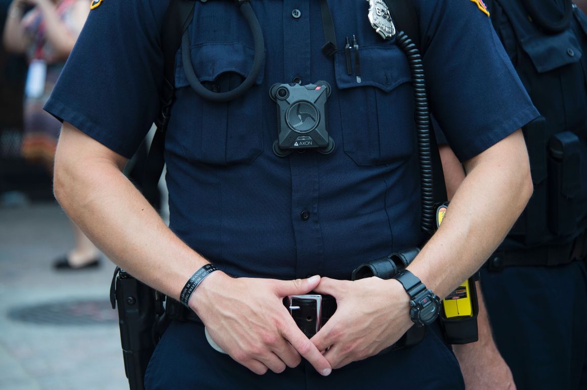 A police officer wears a body camera during an anti-Donald Trump protest in Cleveland