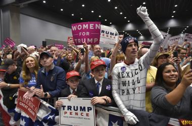 Supporters cheer as then-Republican presidential nominee Donald Trump arrives for a rally at the Sioux City Convention Center in Sioux City, Iowa, on November 6th, 2016.