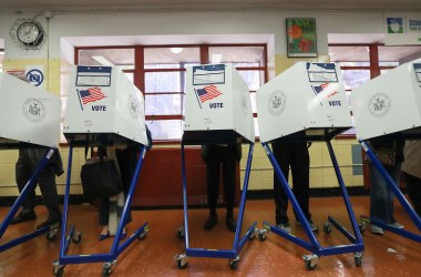 Voters cast their ballots at voting booths on November 8th, 2016, in New York City.