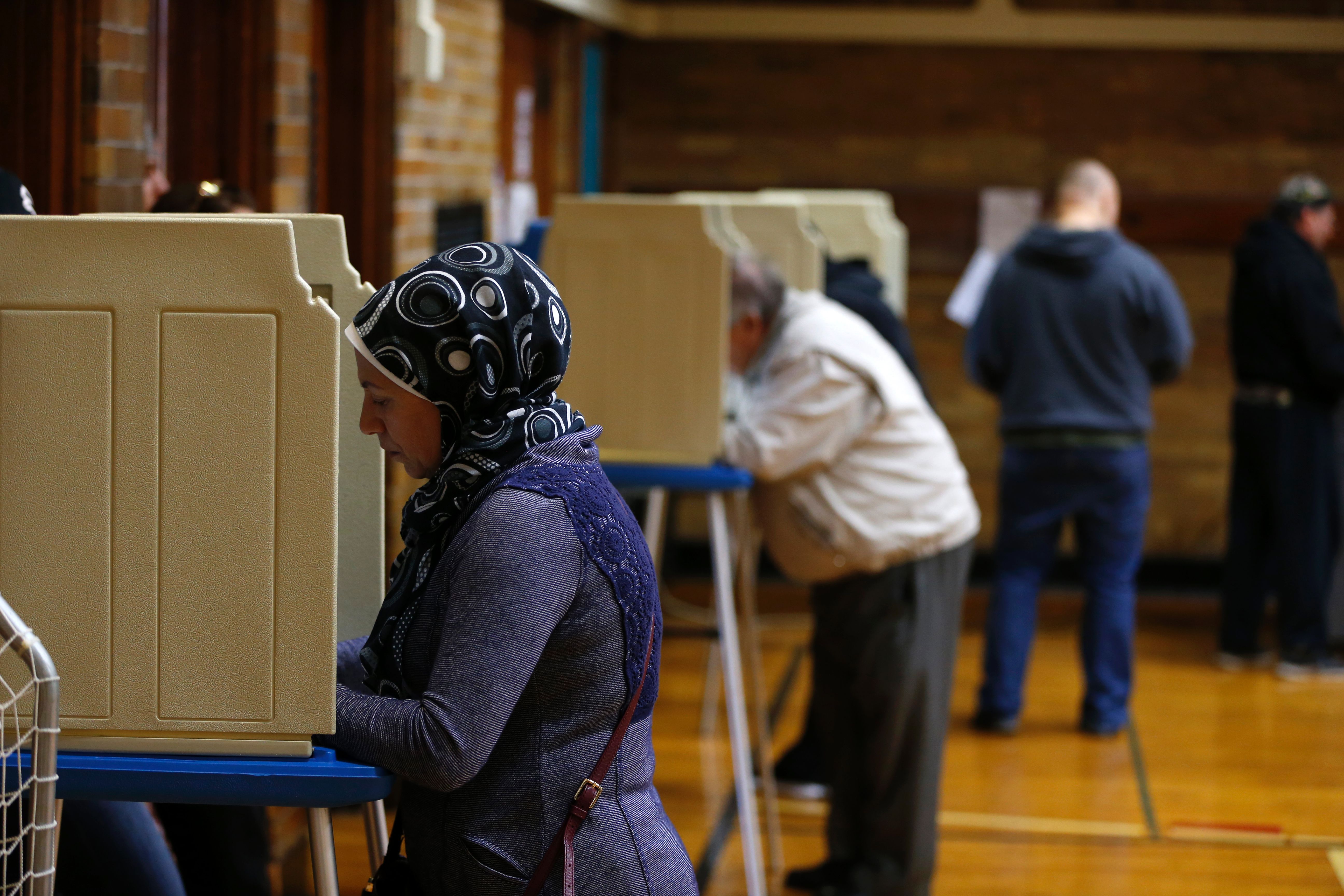 People voting at Oakman Elementary School in the U.S. presidential election on November 8th, 2016, in Dearborn, Michigan.