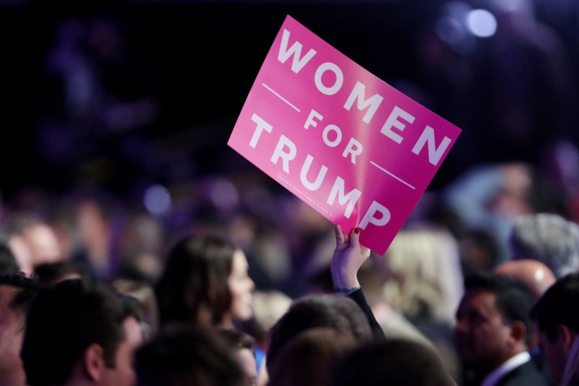 An attendee holds up a 'Women For Trump' sign during the election night event at the New York Hilton Midtown on November 8th, 2016, in New York City.