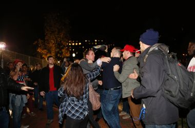 A Hillary Clinton supporter clashes with a Donald Trump supporter outside the White House on November 9th, 2016, in Washington, D.C.