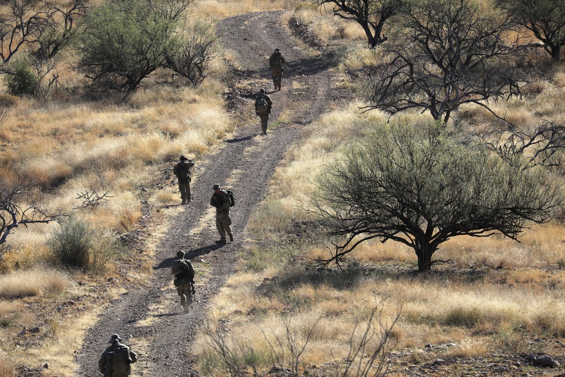 Civilian paramilitaries with Arizona Border Recon search for undocumented immigrants near the U.S.–Mexico border on November 14th, 2016, near Arivaca, Arizona. The armed group, made up mostly of former U.S. military servicemen and women, does not consider itself a militia, but sees itself as supplementing Border Patrol's efforts to control illegal border activity.