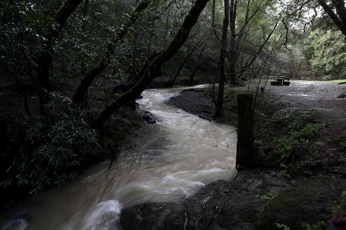 A river of water flows off of Phoenix Lake on January 12th, 2017, in Greenbrae, California.