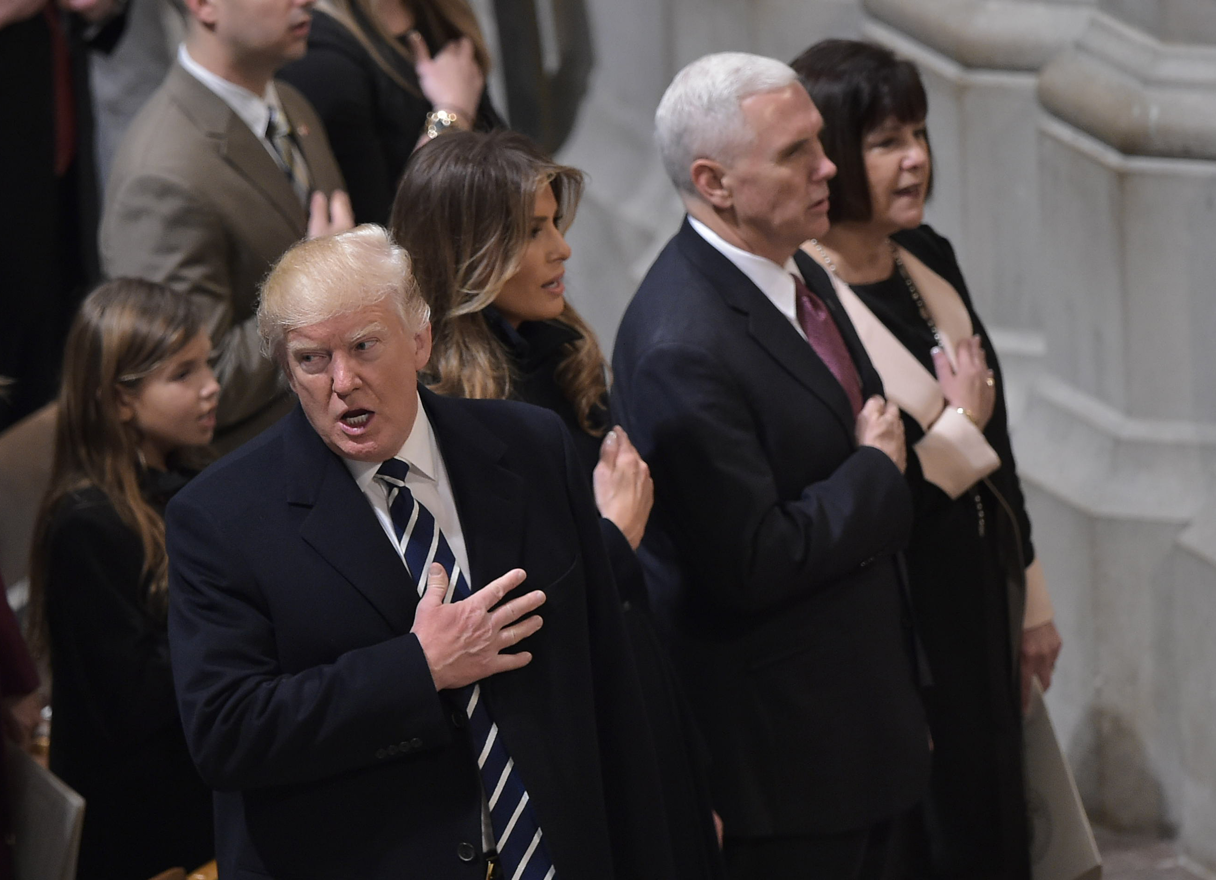 President Donald Trump, First Lady Melania Trump, Vice President Mike Pence, and Karen Pence attend the National Prayer Service at the National Cathedral on January 21st, 2017, in Washington, D.C.