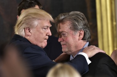 President Donald Trump congratulates then-Senior Counselor to the President Steve Bannon during the swearing-in of senior staff in the East Room of the White House on January 22nd, 2017, in Washington, D.C.