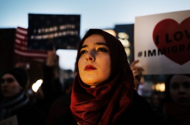 Hundreds of people attend an evening rally at Washington Square Park in support of Muslims and immigrants and against the building of a wall along the Mexican border on January 25th, 2017, in New York City.