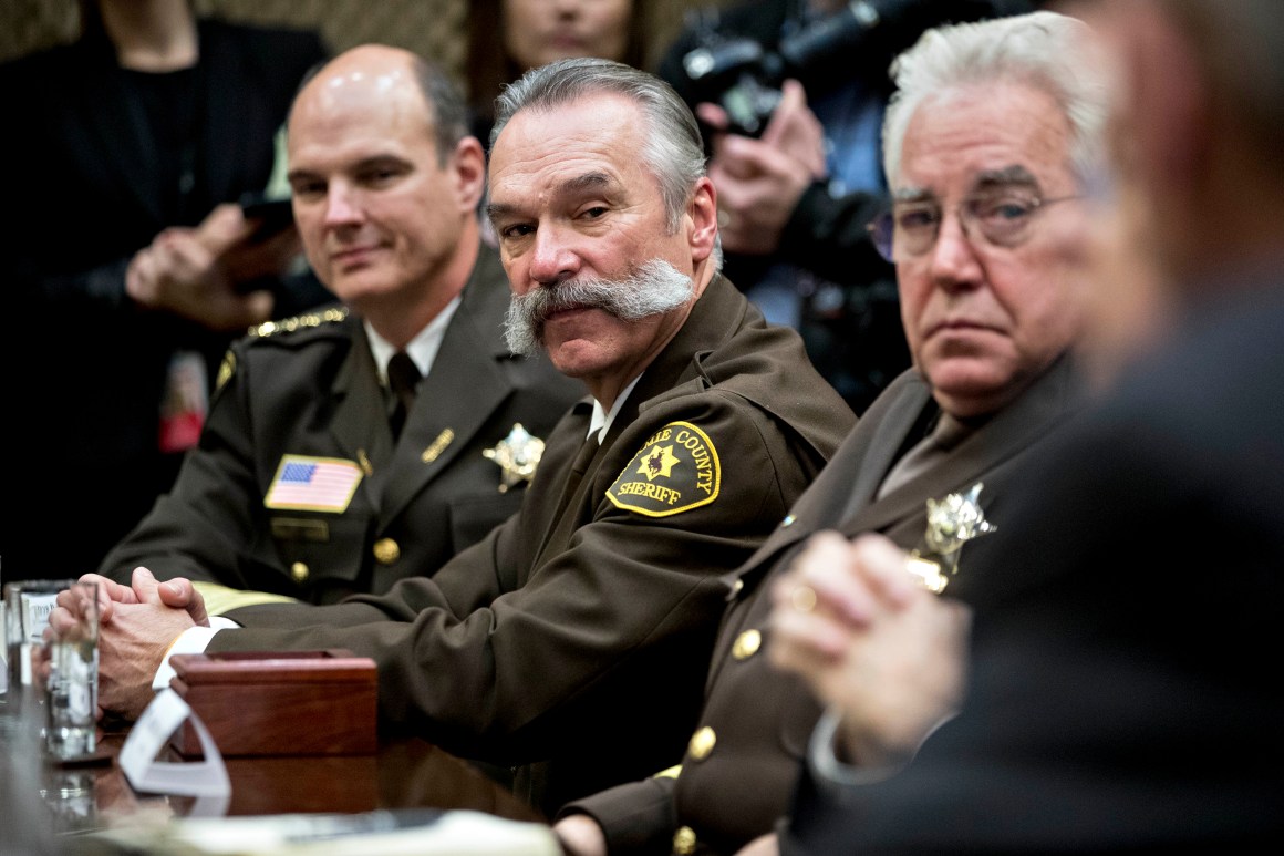 Richard Stanek, sheriff from Hennepin County, Minnesota (left); Danny Glick, sheriff from Laramie County, Wyoming (center); and John Layton, sheriff from Marion County, Indiana (right), at a listening session with President Donald Trump in the Roosevelt Room of the White House on February 7th, 2017.