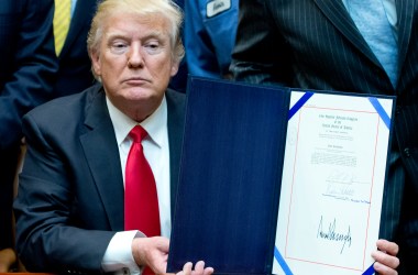 U.S. President Donald Trump signs H.J. Res. 38, disapproving the rule submitted by the U.S. Department of the Interior known as the Stream Protection Rule in the Roosevelt Room of the White House on February 16th, 2017, in Washington, DC.