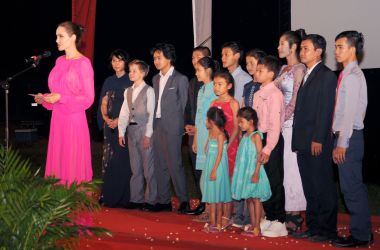 Angelina Jolie speaks as her children and actors of her new film stand on a stage during the premiere of First They Killed My Father at the Elephant Terrace inside the Angkor park in Siem Reap on February 18th, 2017.