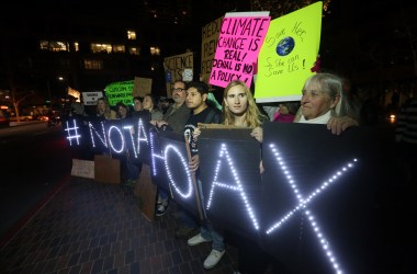 Protesters display signs during a rally against climate skepticism in San Diego, California, on February 21st, 2017.