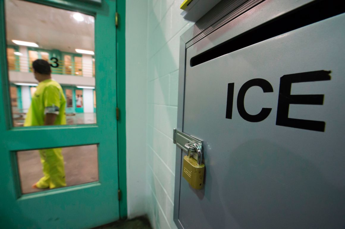 An immigration detainee stands near an Immigration and Customs Enforcement grievance box in the high security unit at the Theo Lacy Facility in Orange, California, on March 14th, 2017.