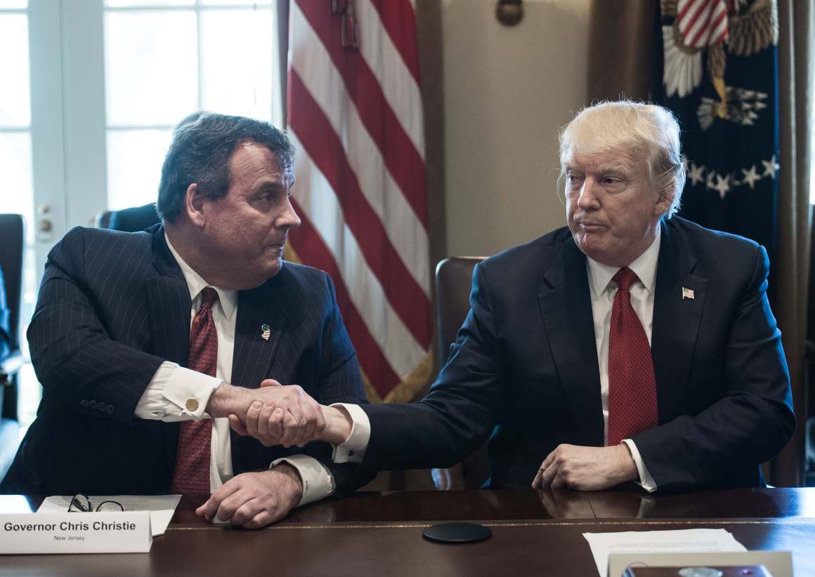 President Donald Trump shakes hands with New Jersey Governor Chris Christie during a meeting about opioid and drug abuse on March 29th, 2017.