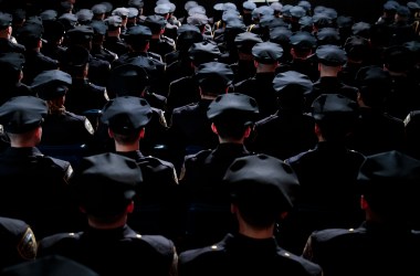 Members of the New York City Police Department attend their police academy graduation ceremony on March 30th, 2017.